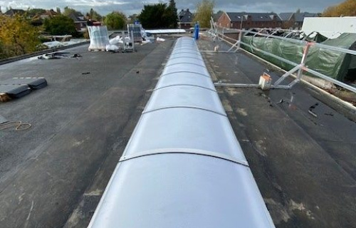 Renovatie lichtstraat bedrijfshal Breda